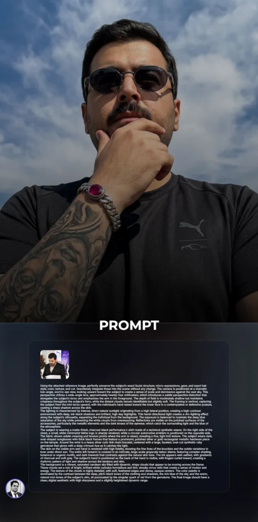 A powerful low-angle portrait of a man in a black technical shirt and sunglasses, featuring an intricate tattoo sleeve and a silver ruby bracelet against a vibrant blue sky.